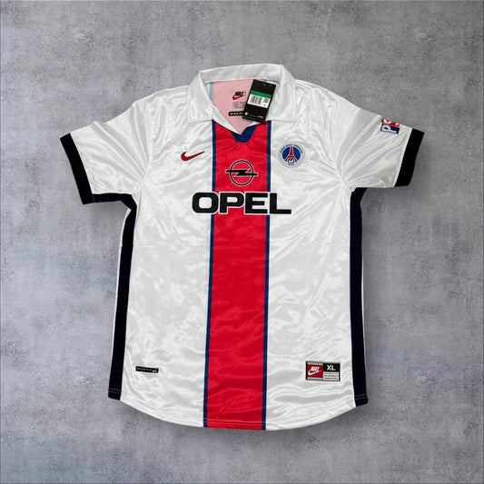 PSG away kit- 1998/99 white base with red stripe and blue accents down the middle